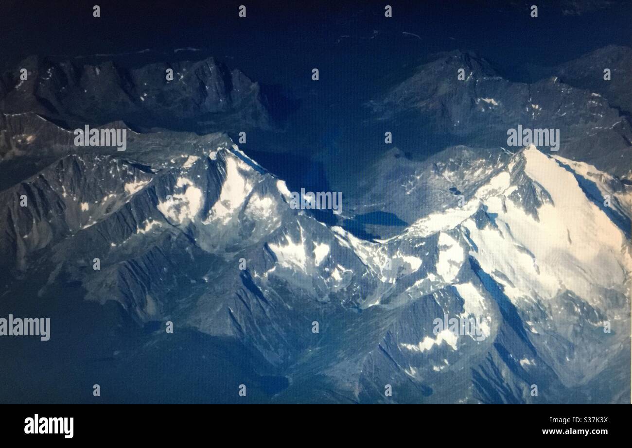 Aerial photography, Canadian Rockies, mountains, Rocky Mountains, Rugged ,jagged, back country, steep, peaks, valleys - Smartphone Captured Stock Image