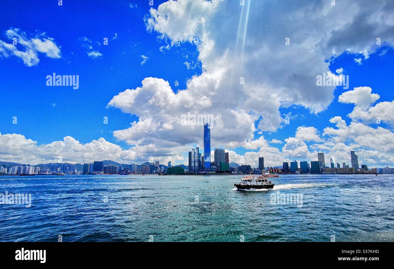 A panoramic view of western Kowloon as seen from Victoria harbour in Hong Kong. - Smartphone Captured Stock Image