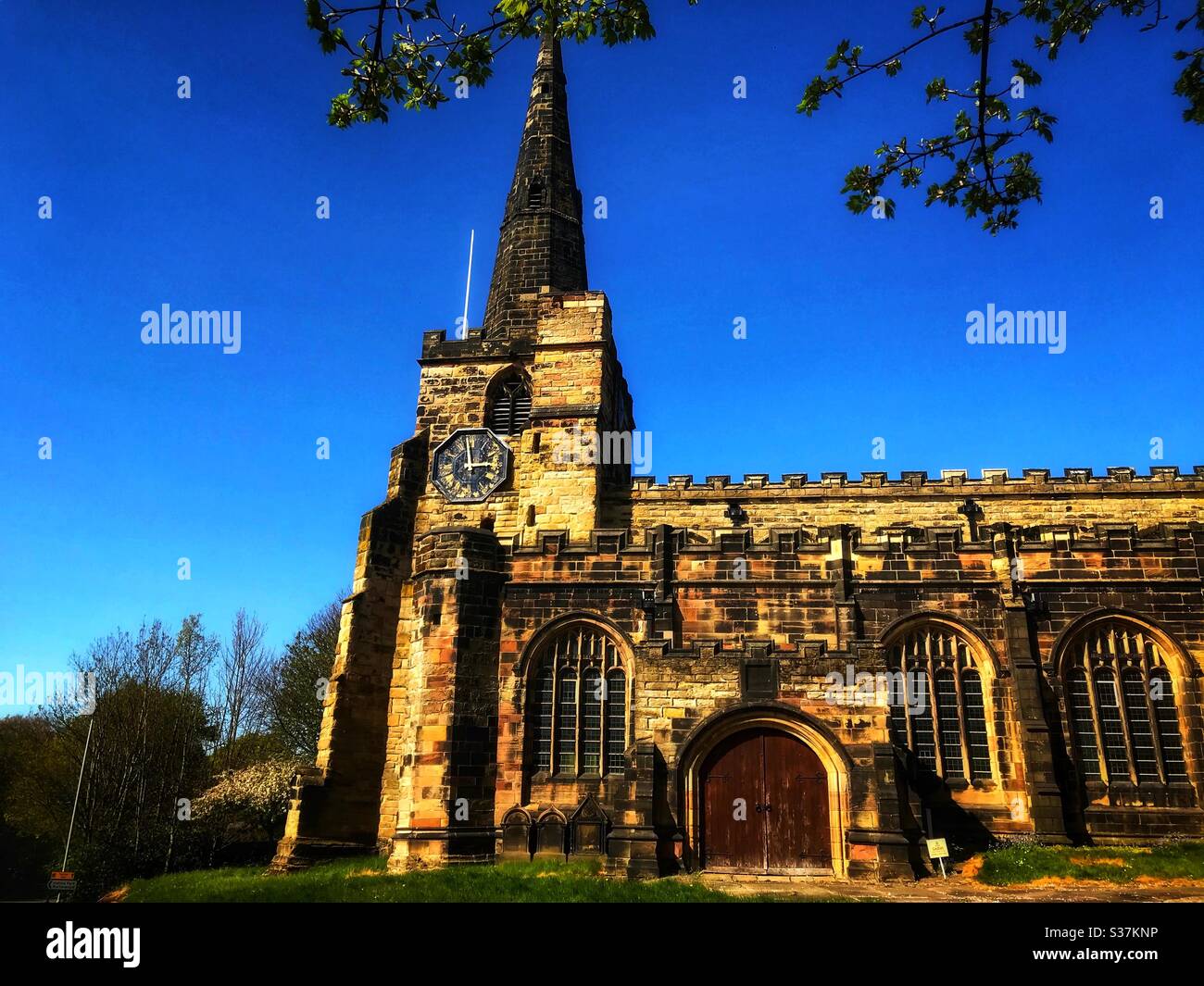 Picture of Saint Oswald’s church in Winwick Cheshire on a lovely spring day April 19th 2020 in lockdown. Stock Photo