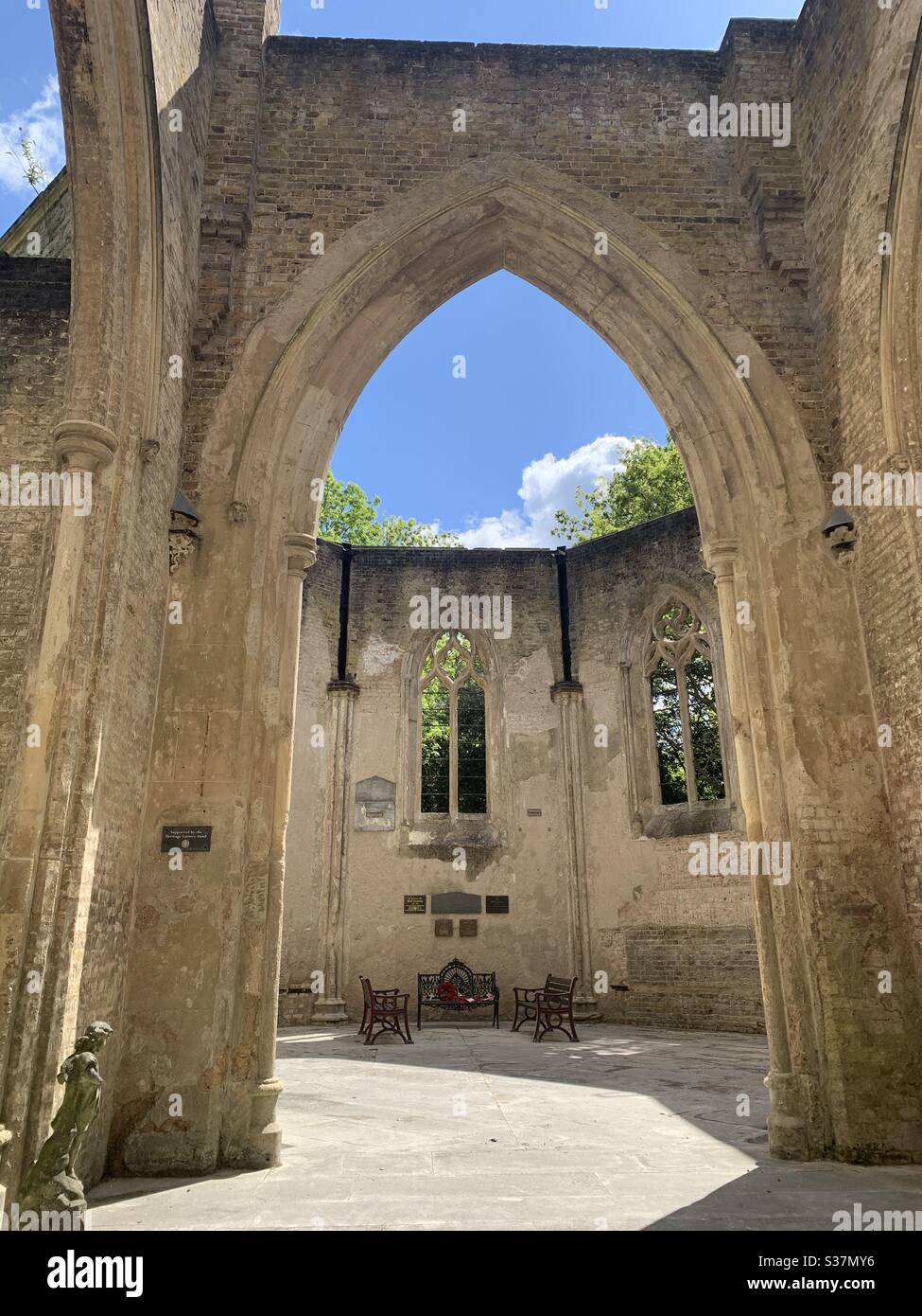 Empty table and chairs inside chapel - Smartphone Captured Stock Image
