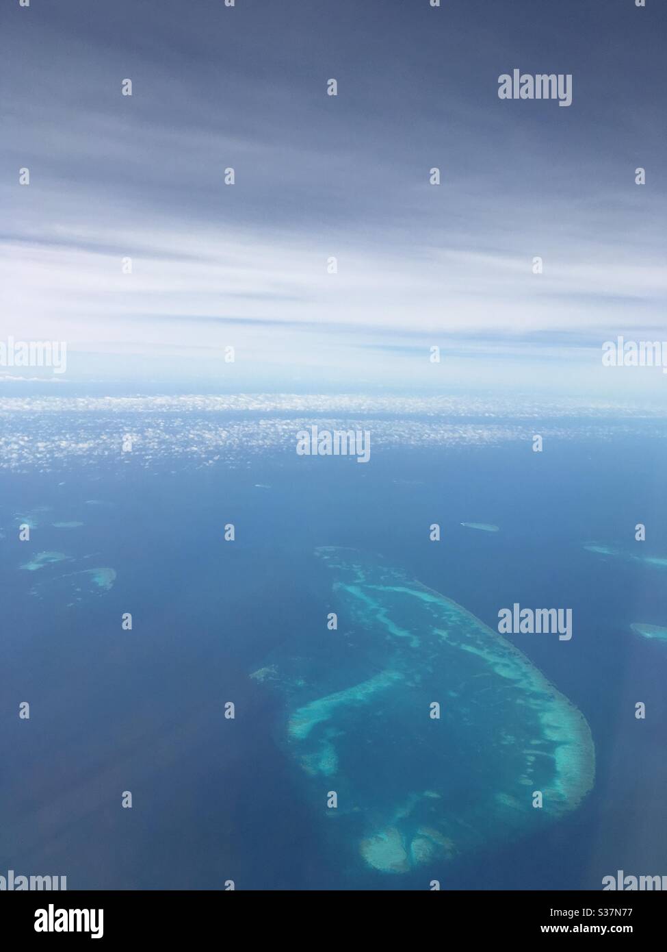 Flight over The Great Barrier Reef south oh Cairns Stock Photo Alamy
