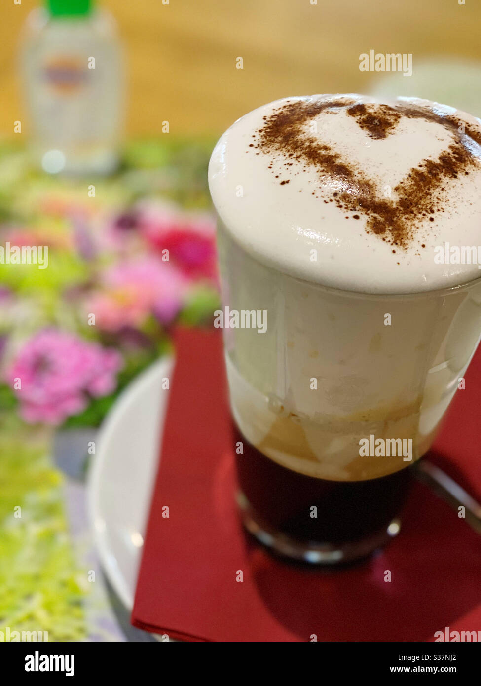 Coffee with heart and Desinfection. Stock Photo