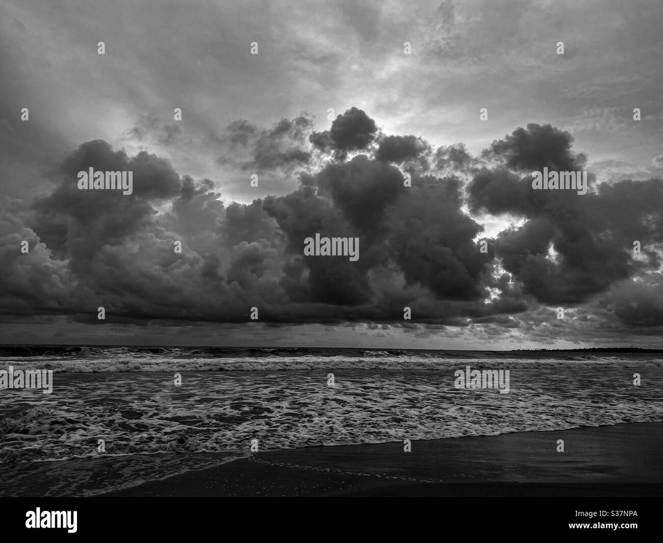 Cloudy during sunset in Mumbai, Juhu Beach of India. - Smartphone Captured Stock Image