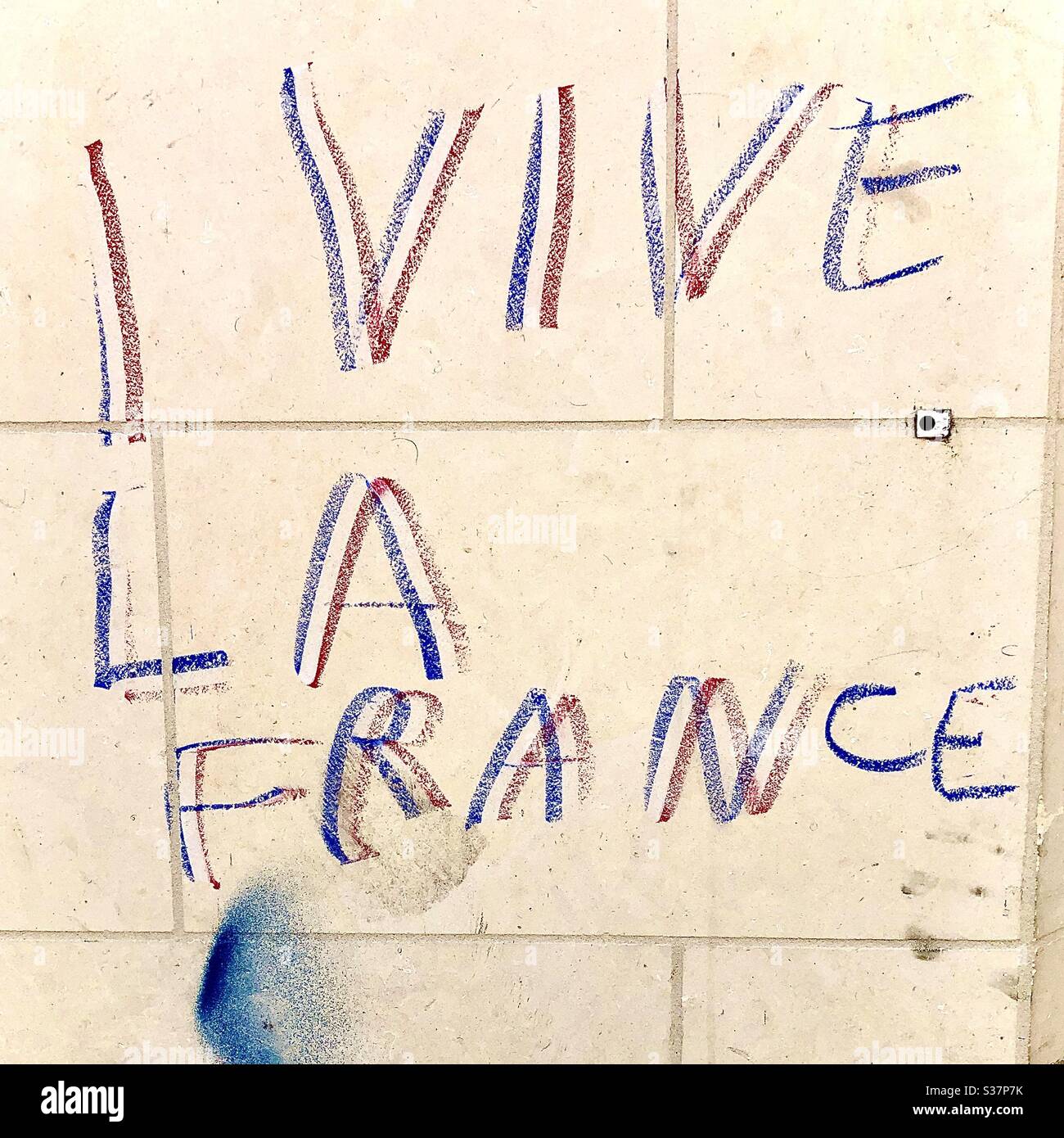 French graffiti on wall - France. Stock Photo
