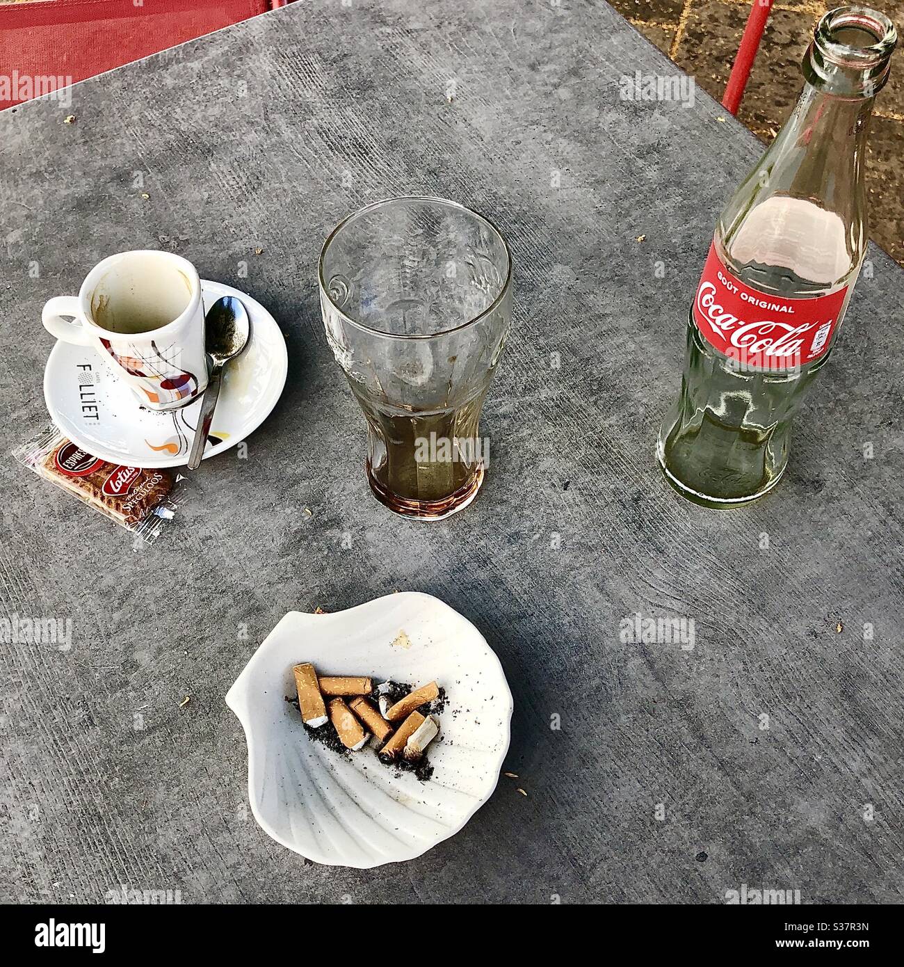 Left-overs on café table. Stock Photo