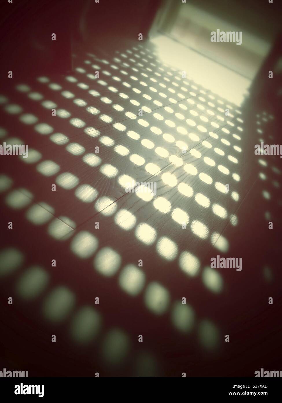 Shadow Window Light on Palquet Floor - Smartphone Captured Stock Image