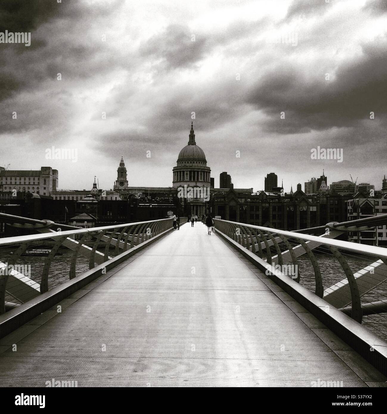 The normally packed Millennium Bridge, London, almost completely devoid of tourists. - Smartphone Captured Stock Image