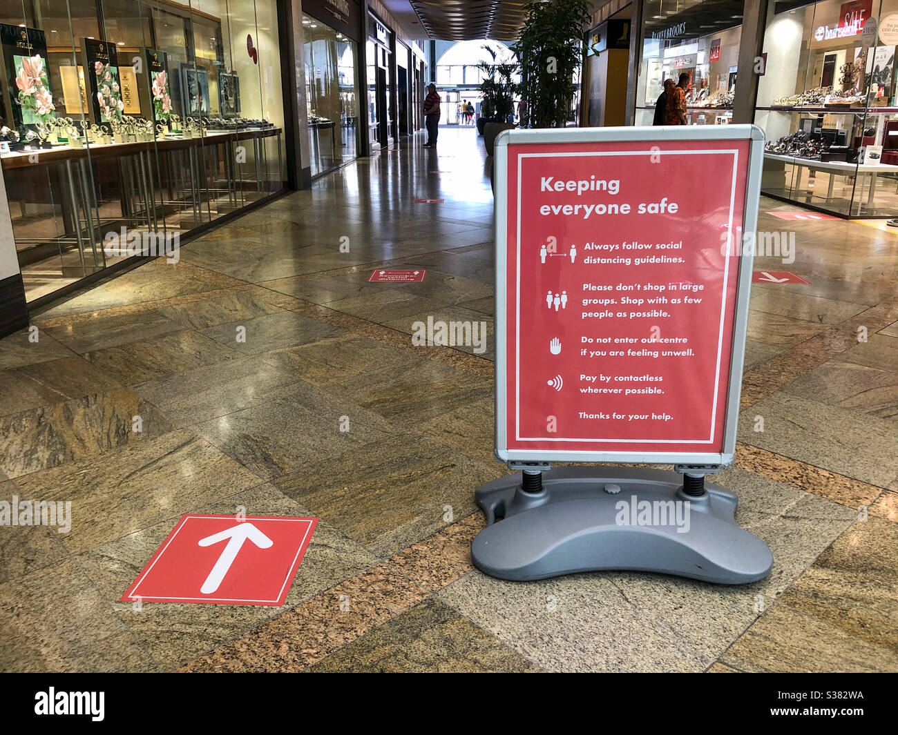 A one way system in force in a shopping centre in The UK. - Smartphone Captured Stock Image