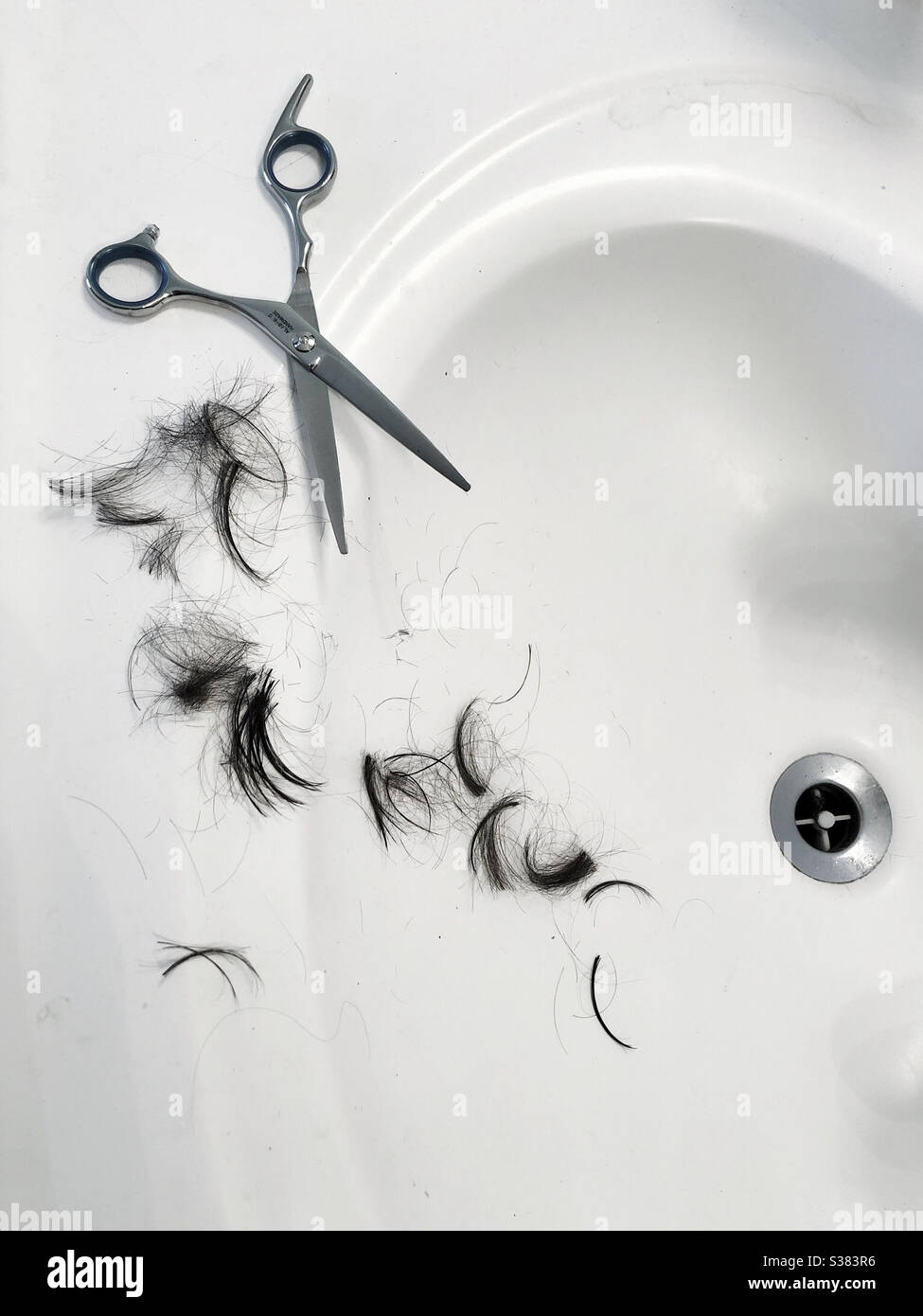 Home haircut in bathroom - Smartphone Captured Stock Image
