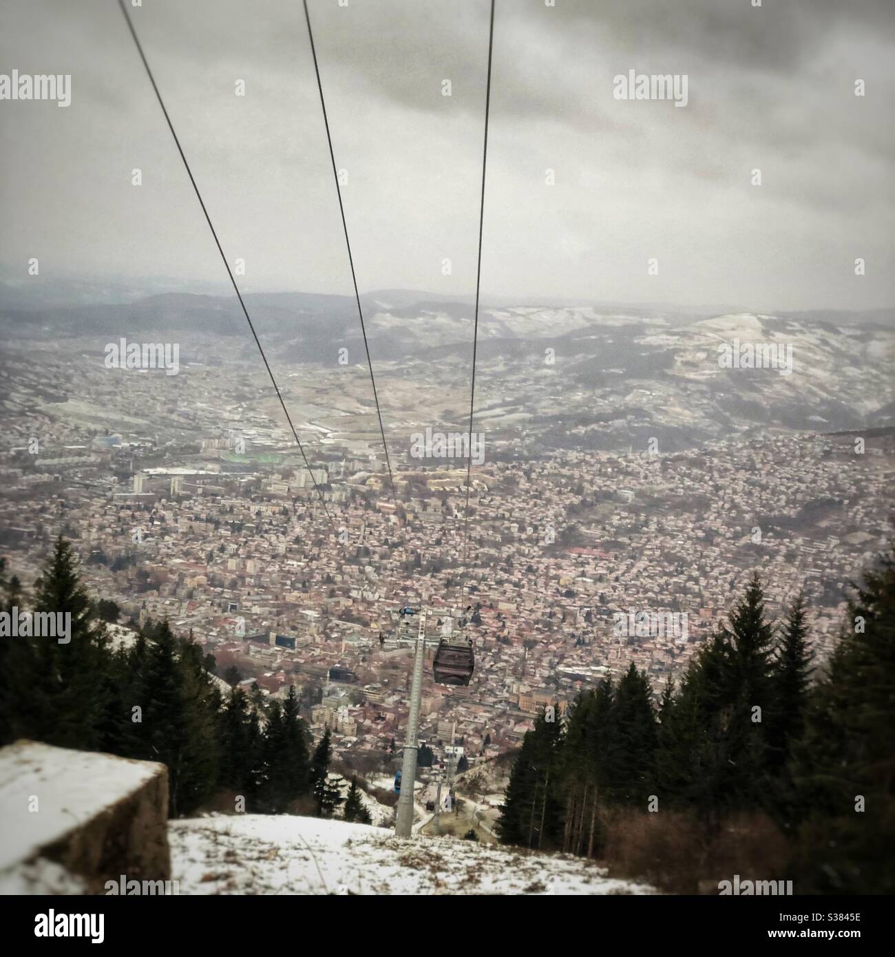 Ski lift over Sarajevo during winter - Smartphone Captured Stock Image