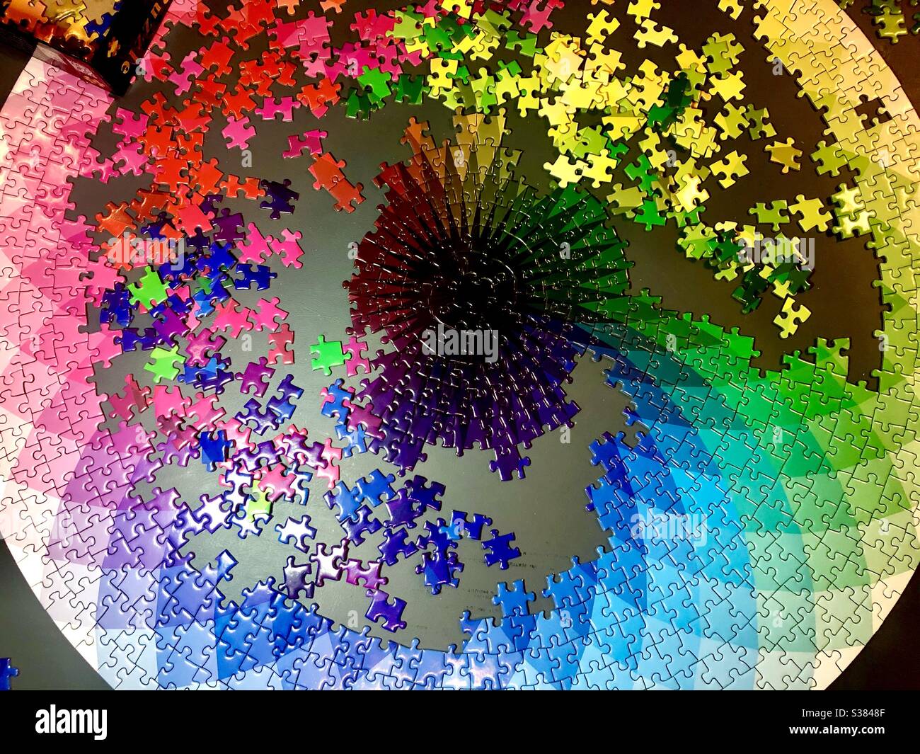 Completing a large jigsaw puzzle - Smartphone Captured Stock Image