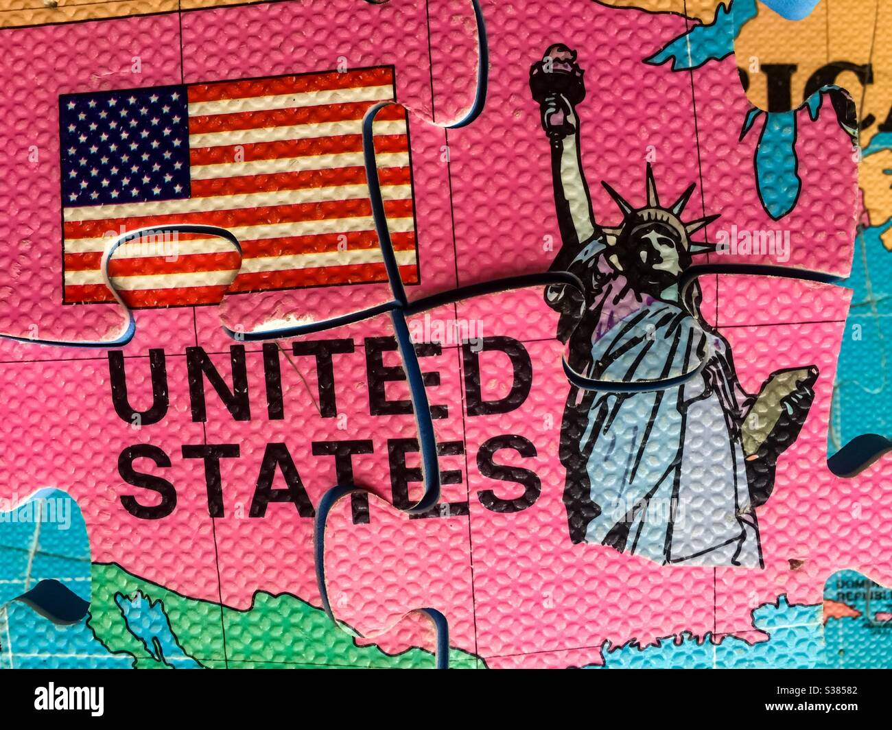 A deeply divided USA, showing heightened polarization and extreme divisions in a 3D puzzle, conceptual image. Fault lines. Economic. Social. Political. Blue and Red. - Smartphone Captured Stock Image