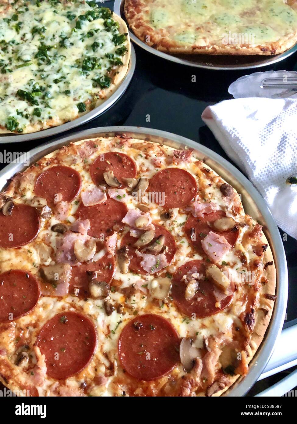 Closeup of three pizza - Smartphone Captured Stock Image