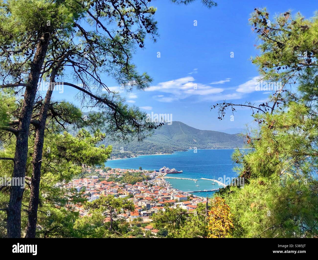 View from Acropolis at Limenas, the capital of Thassos island, and the green mountains behind. - Smartphone Captured Stock Image