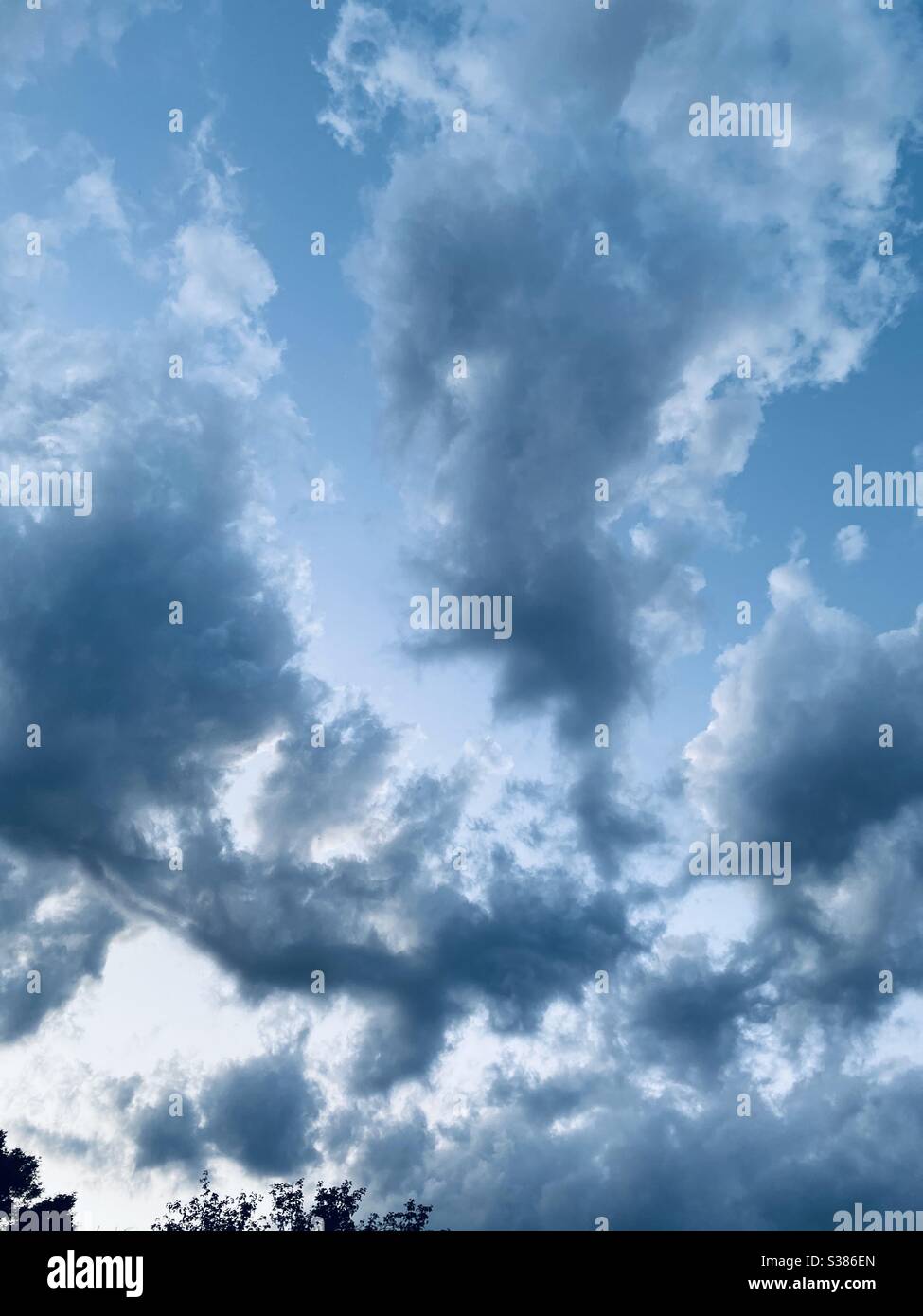 Clouds in the sky on a warm day Stock Photo