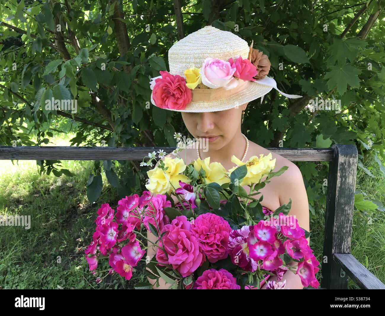 Young Girl with Flowers Stock Photo