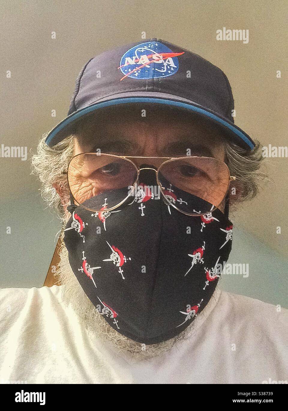 Me in a Pirate-themed face mask, ready for July 24th when it will be mandatory to wear them in shops in the UK - Smartphone Captured Stock Image
