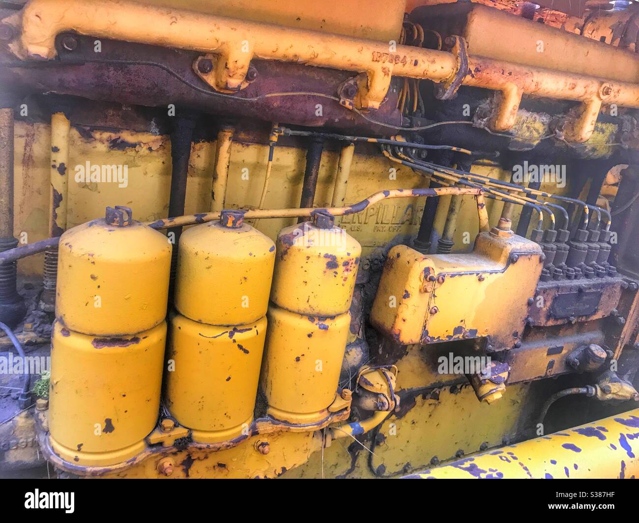 Old Caterpillar tractor used in the logging industry in the Pacific Northwest.  Collier State Park Logging Museum, Oregon USA - Smartphone Captured Stock Image