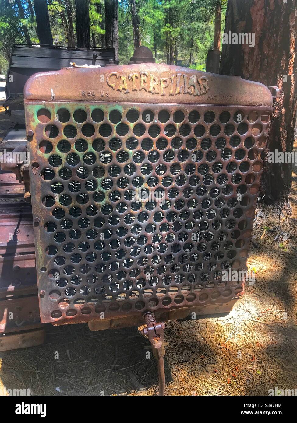 Old Caterpillar tractor used in the logging industry in the Pacific Northwest.  Collier State Park Logging Museum, Oregon USA - Smartphone Captured Stock Image