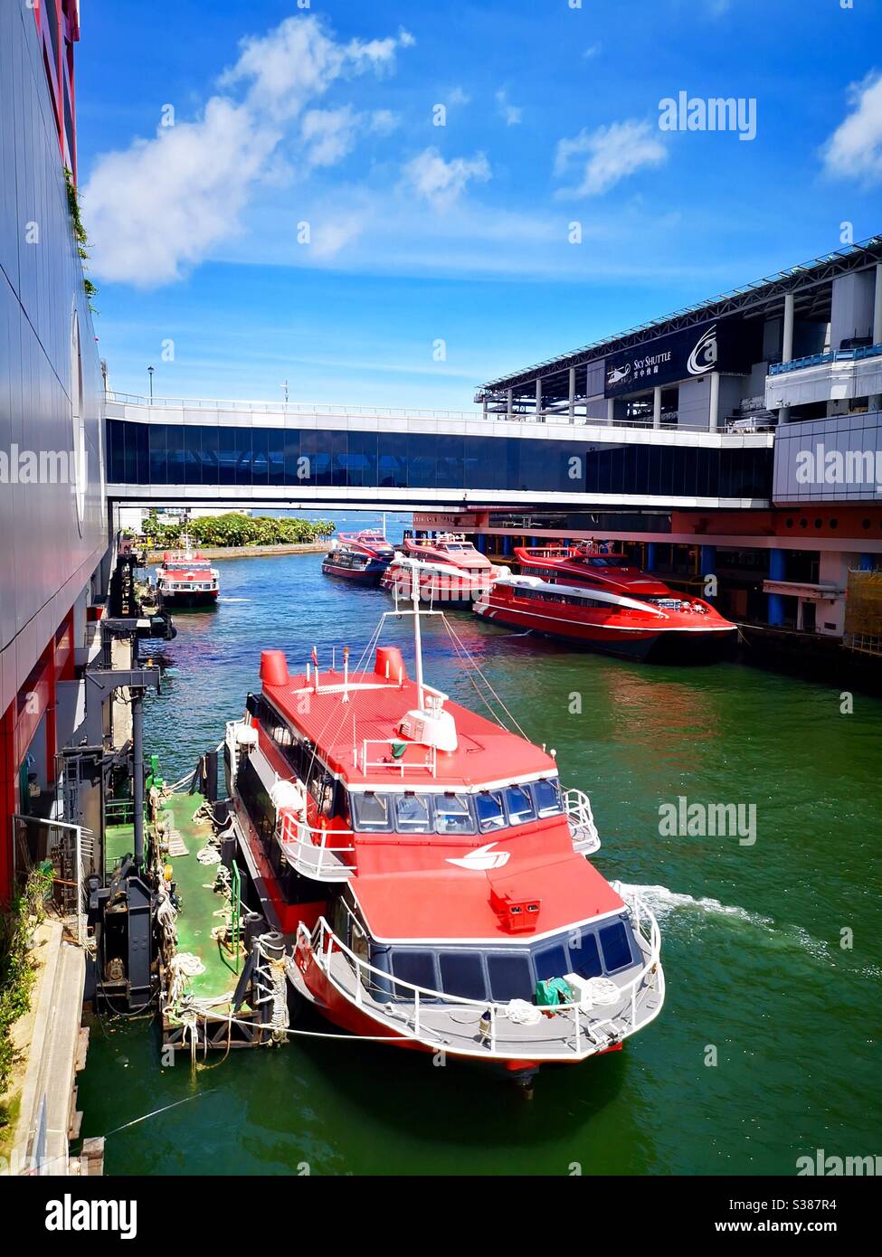 Macau ferry turbo jet ferry boats docked at the Macau ferry terminal as the service to Macau is halted during the third phase of the Covid 19 pandemic. (  July 2020 ) - Smartphone Captured Stock Image