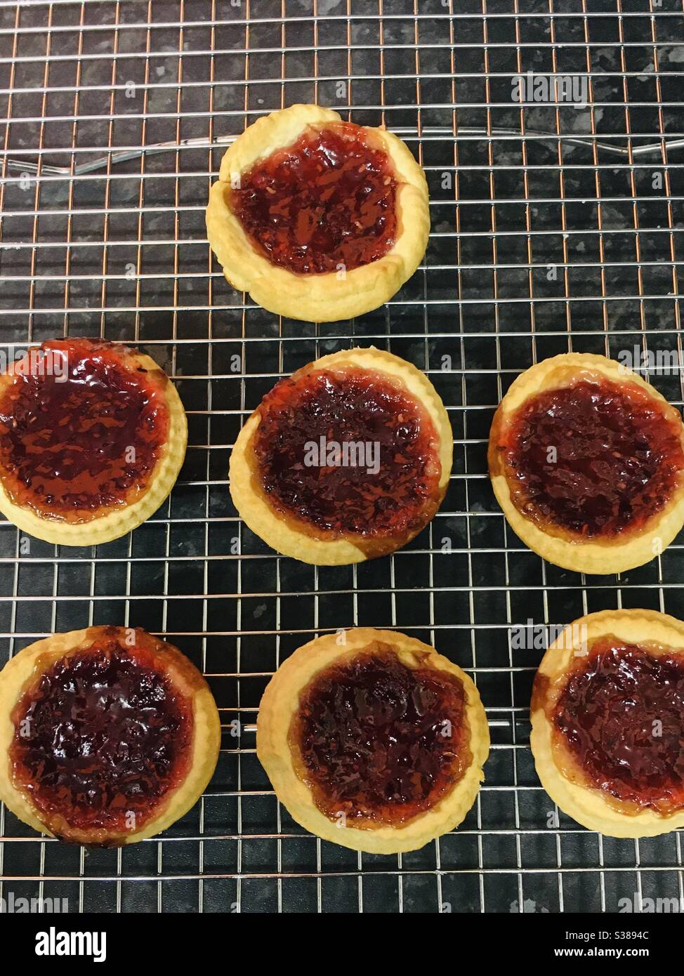 Home made Jam tarts home baking Stock Photo Alamy