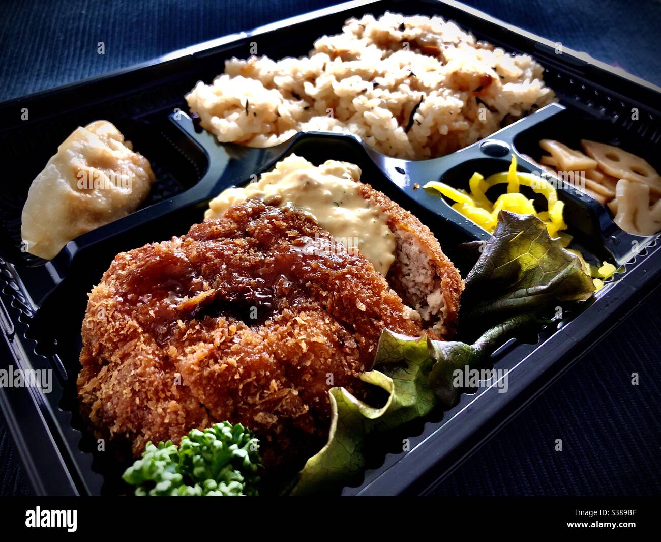 Japanese yoshoku western style food lunch: menchi katsu (ground meat  cutlet) bento box Stock Photo - Alamy