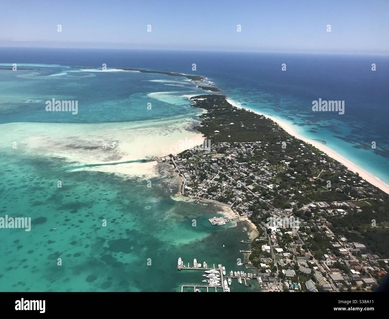 Aerial view of Dunmore Town, Harbour Island, Bahamas and its famous Pink Sand Beach. Stock Photo