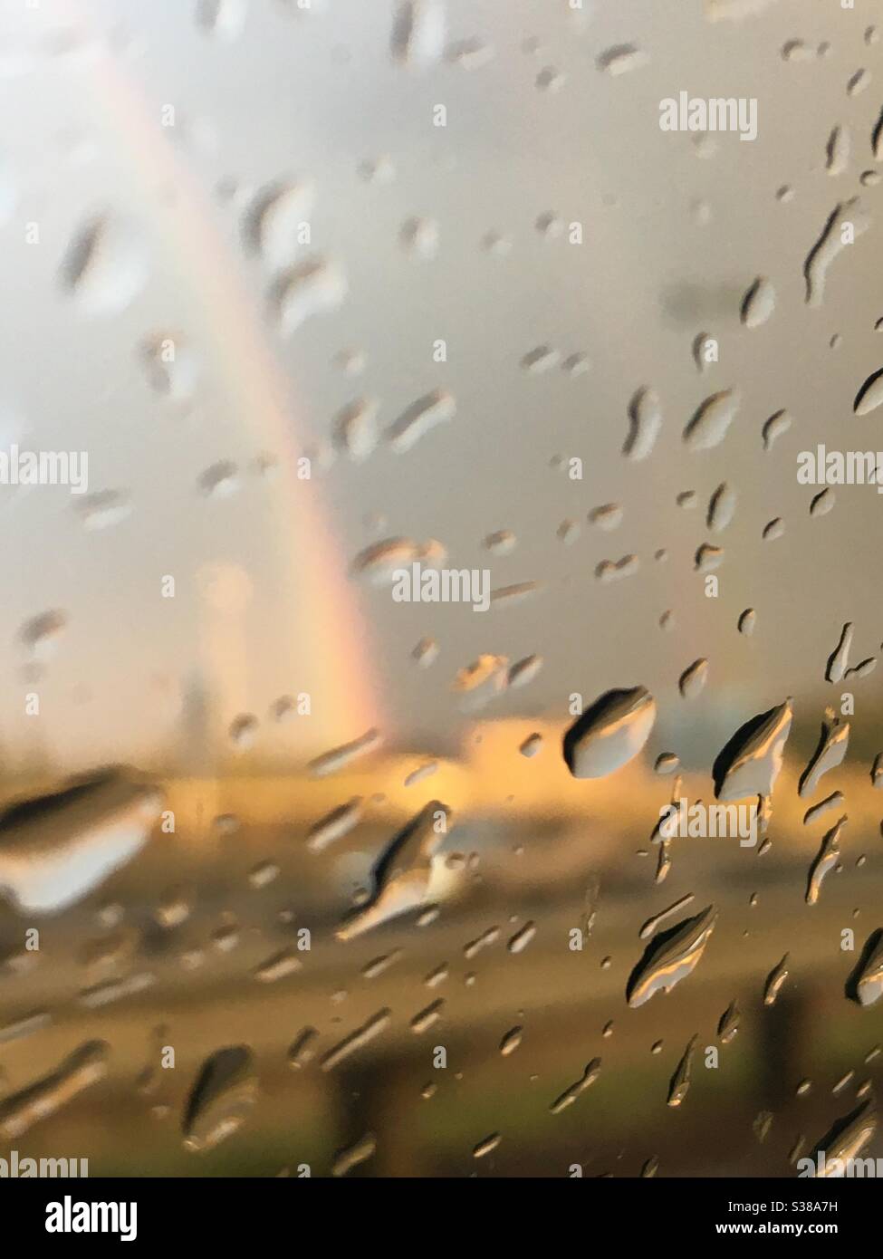 rainbow on a rainy day Stock Photo