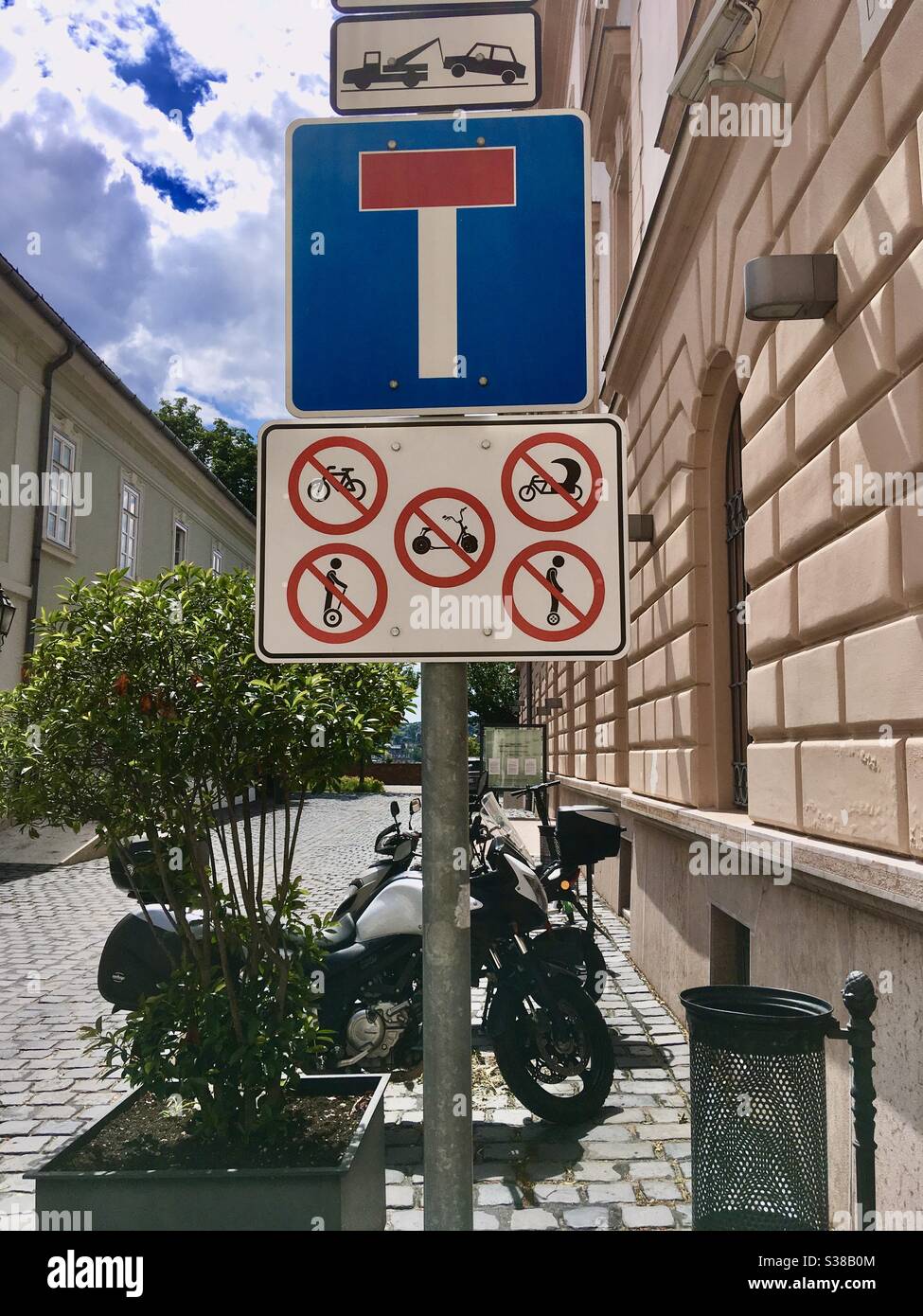 Traffic sign in Buda Castle, no bicycle or scooter riding, in Budapest, Hungary - Smartphone Captured Stock Image