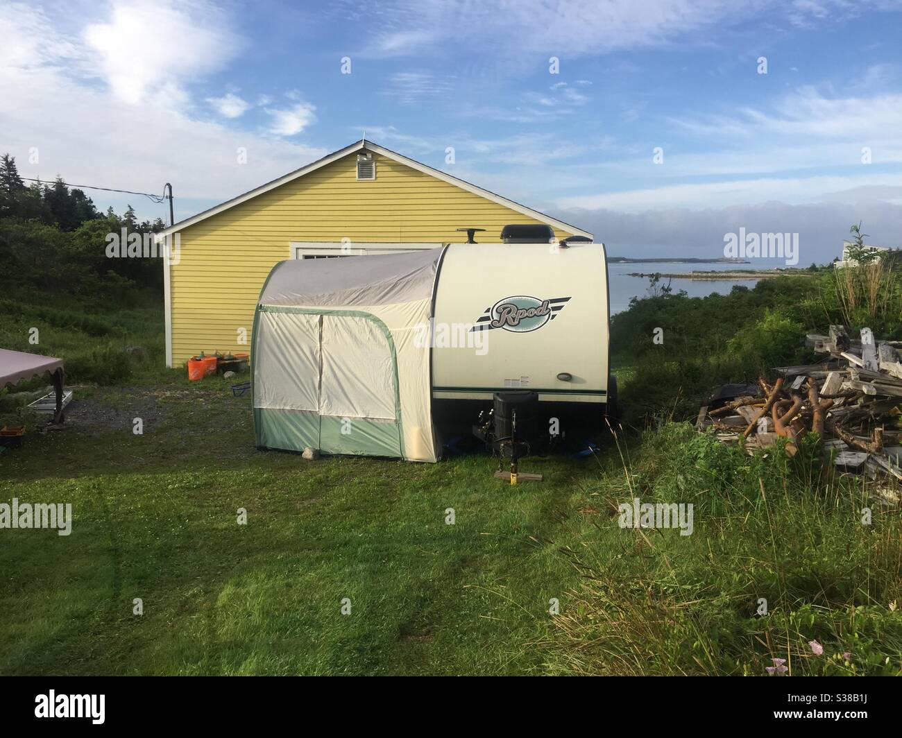 Staycation with a stationary trailer overlooking the sea, Nova Scotia, Canada Stock Photo