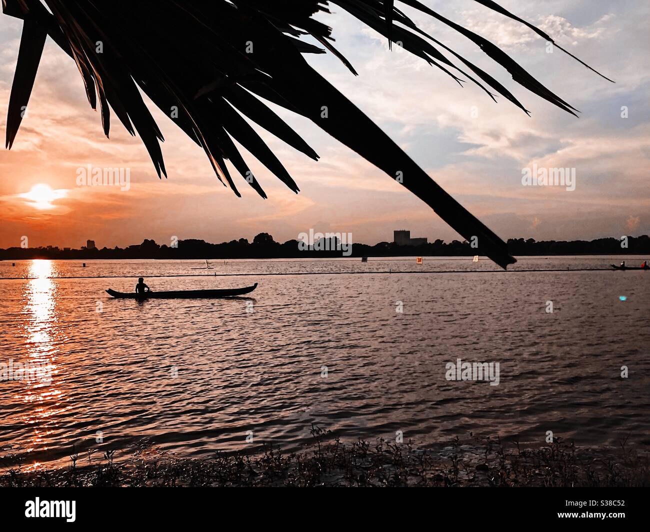 Sunset on the lake in Yangon, Myanmar Stock Photo