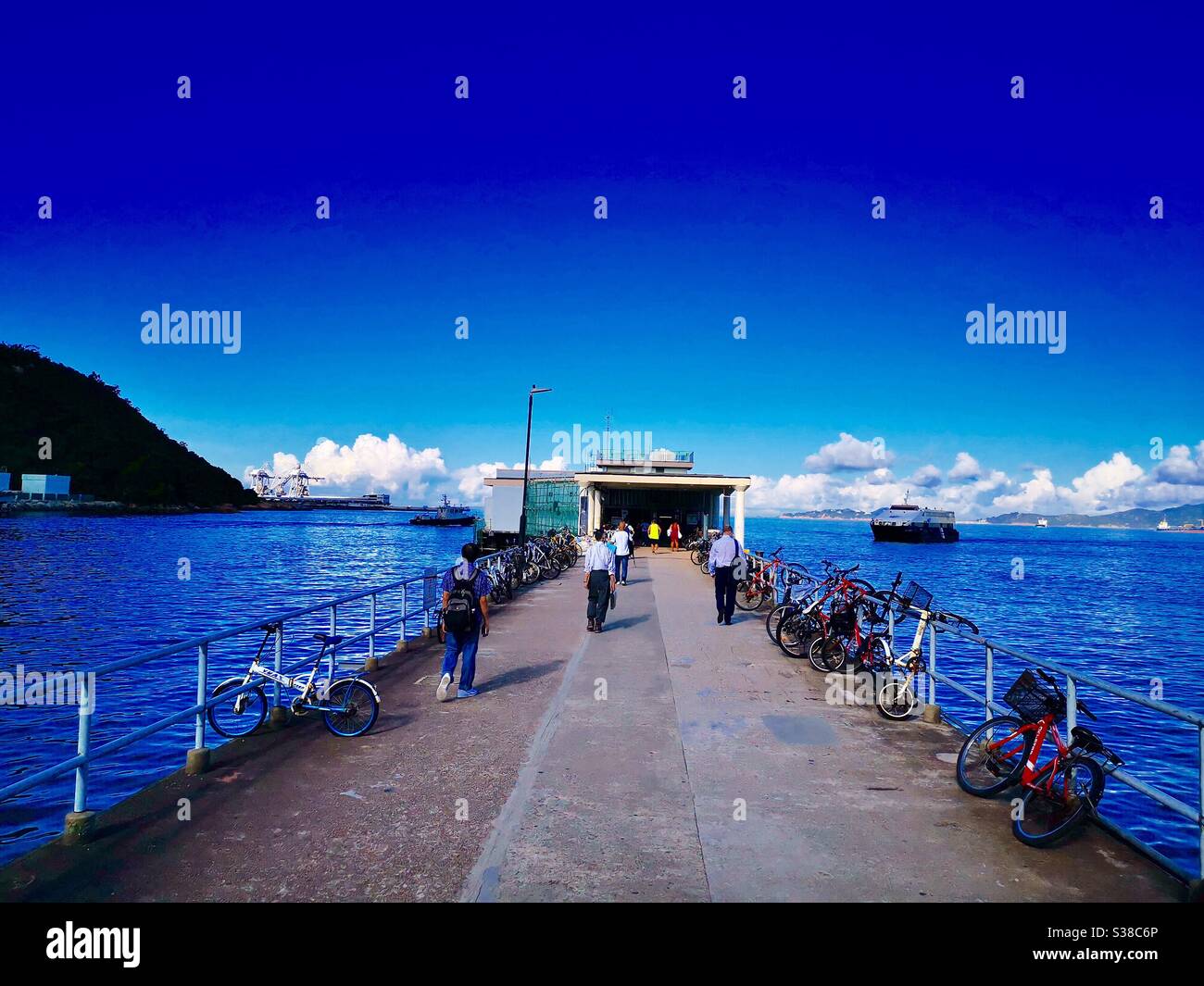 Yung Shue wan ferry pier on Lamma Island in Hong Kong. - Smartphone Captured Stock Image