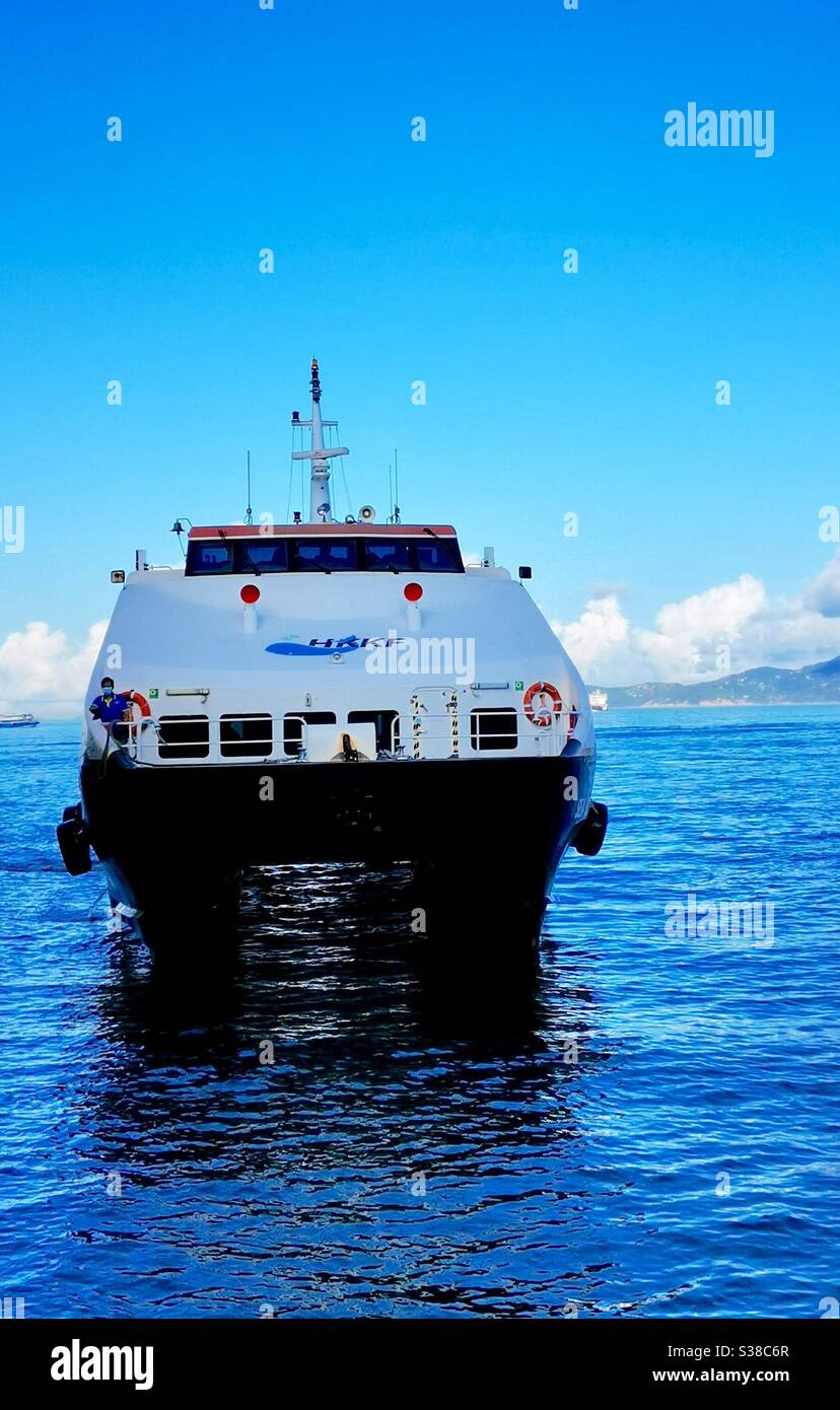The Yung Shue Wan ferry from central arriving . - Smartphone Captured Stock Image
