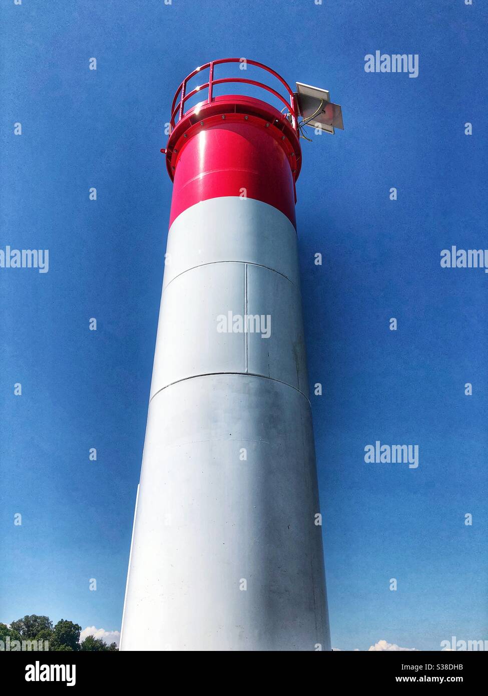 Red and white lighthouse. Stock Photo