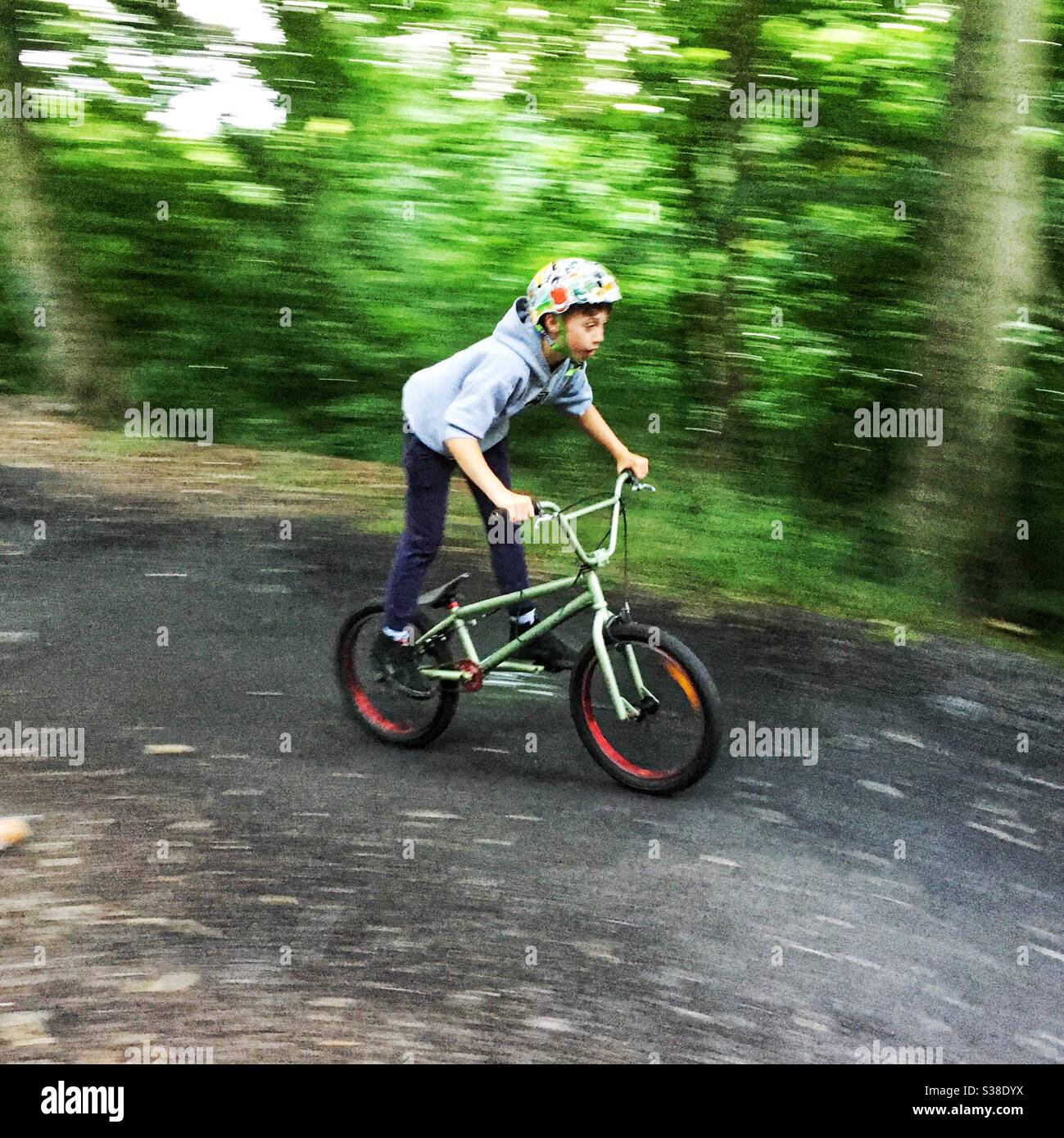 Eleven year old boy riding a bmx bike, Sheffield, England, United Kingdom. Stock Photo