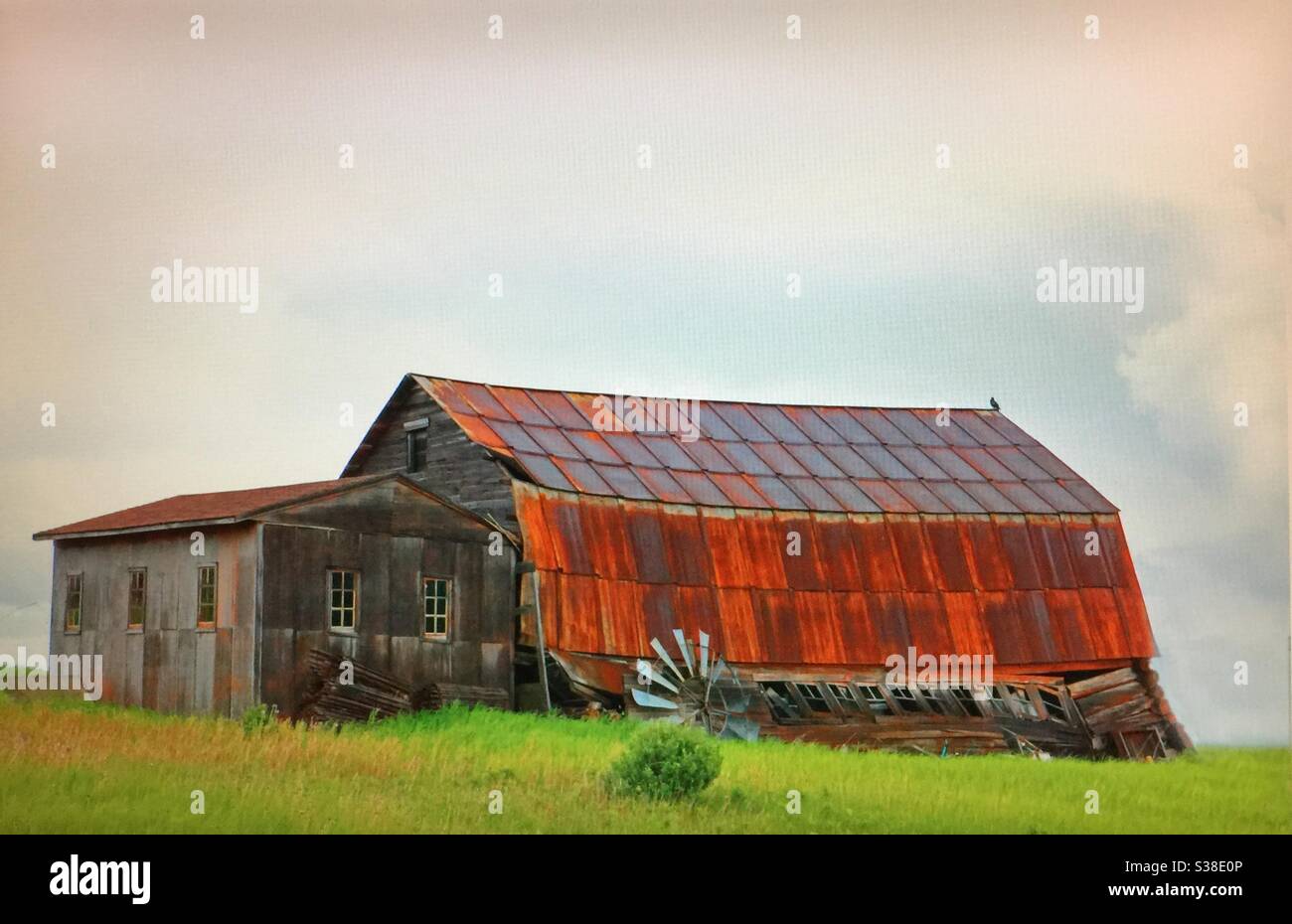 Old red barn, historic. Alberta, Canada , tipping, toppling,sad shape
