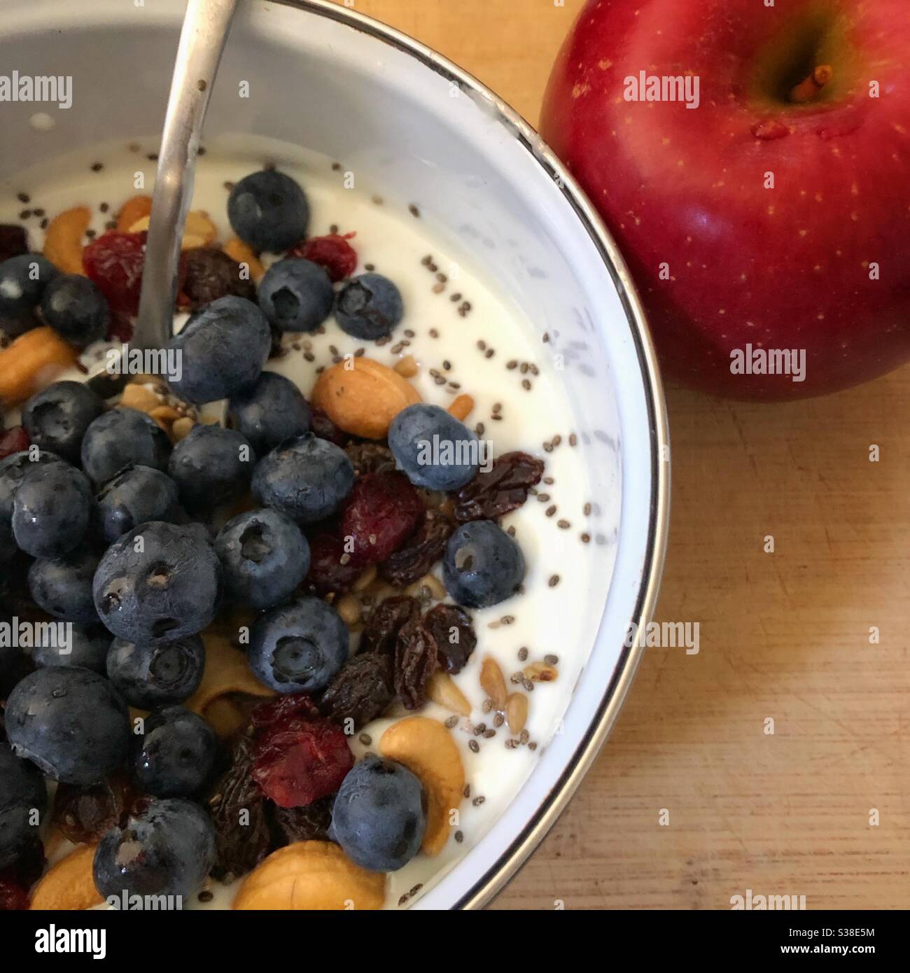 Blueberries and yogurt for breakfast. Stock Photo