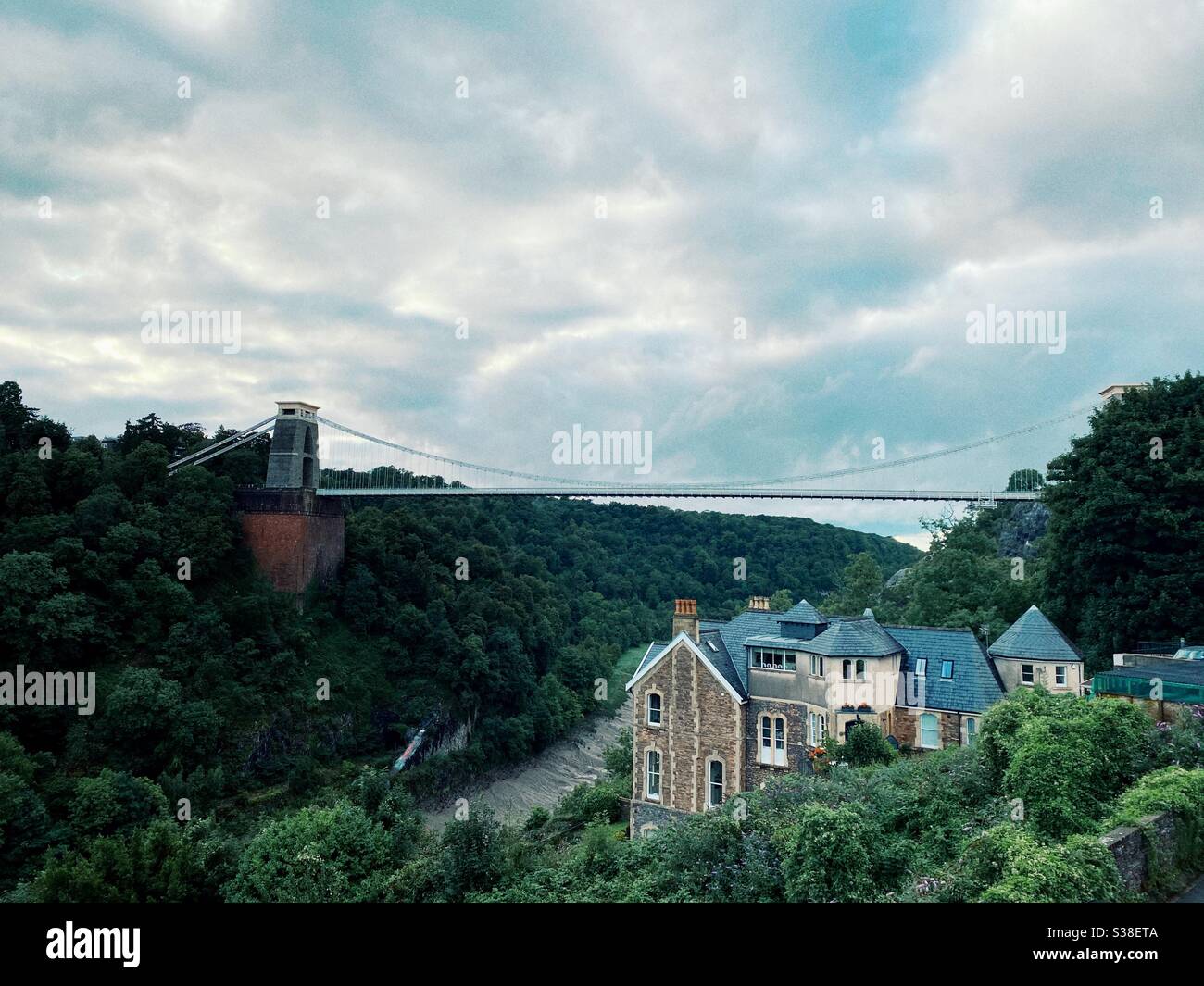 Moody picture of the Clifton suspension bridge early evening as the light is going, Brunel, Bristol, UK - Smartphone Captured Stock Image