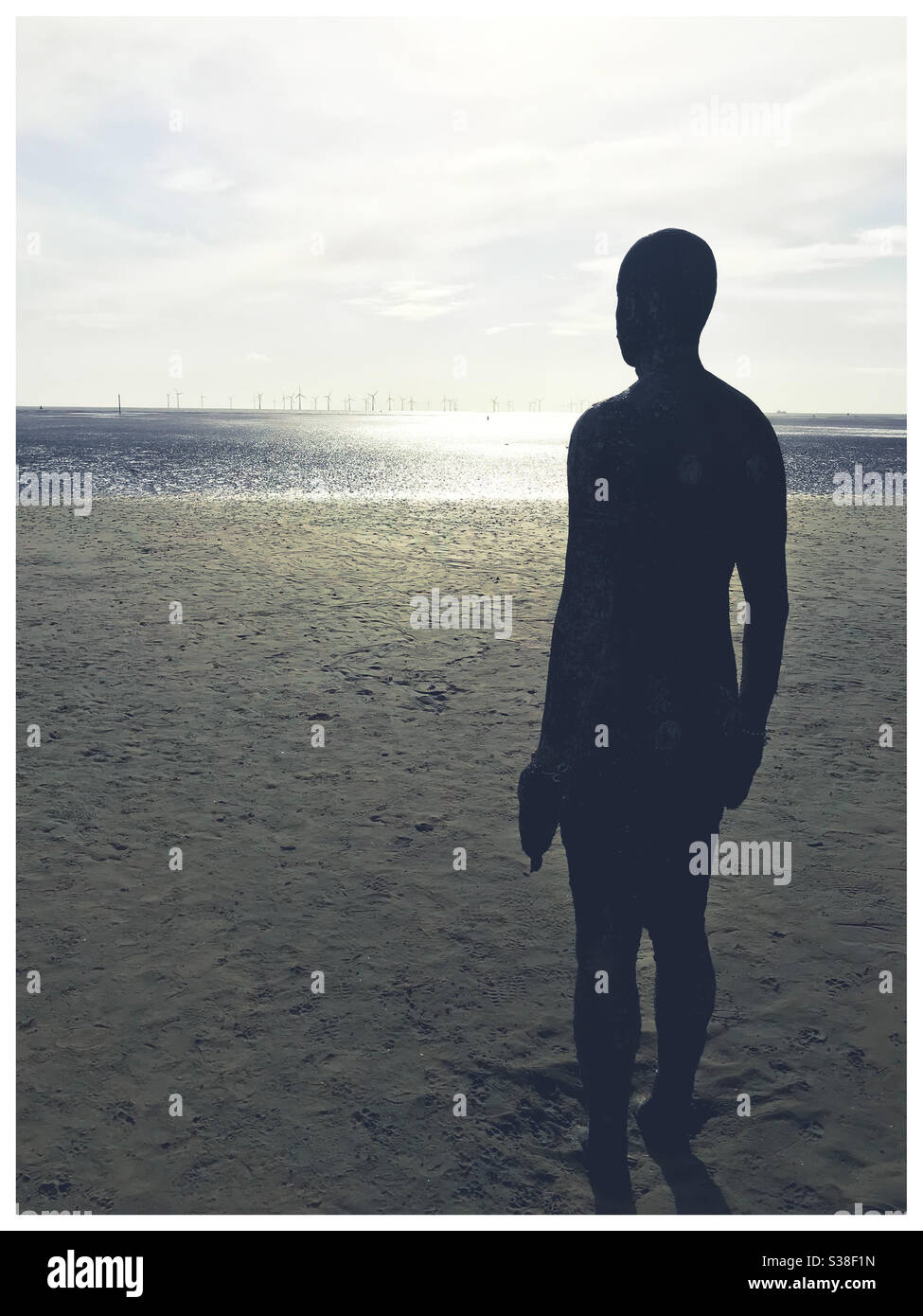 Anthony Gormley’s Other Place, Crosby beach Stock Photo