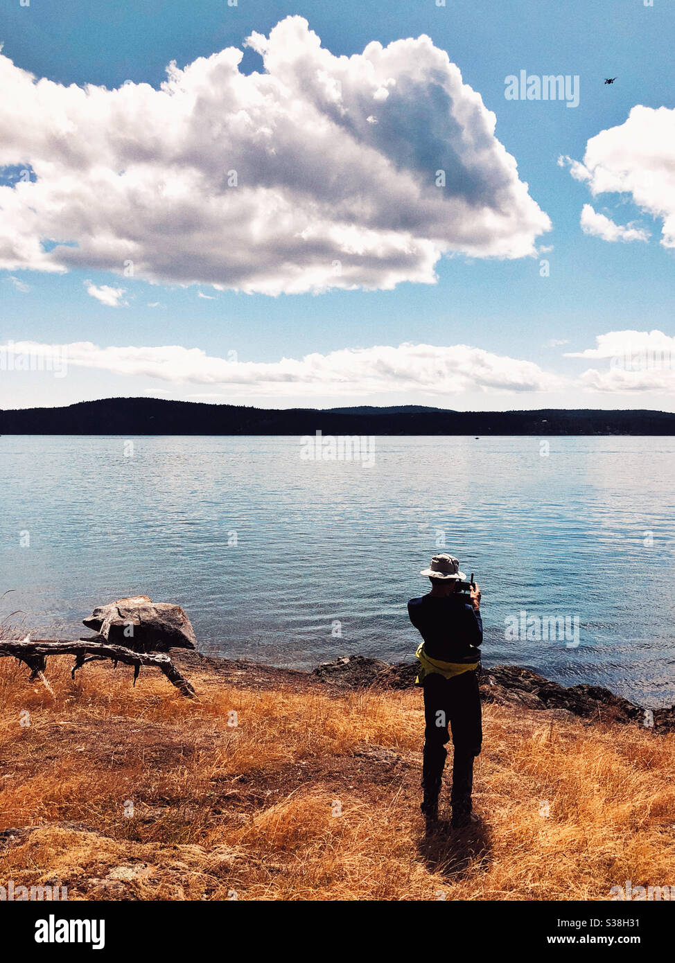 Flying the drone off Jones Island in San Juan Islands archipelago - Smartphone Captured Stock Image