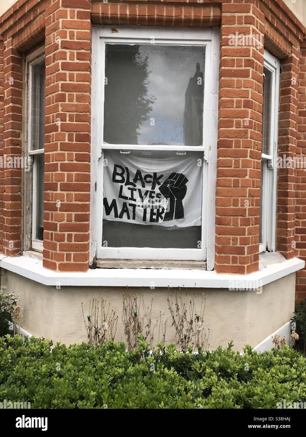 Black Lives Matter sign in a window of a house. London, England. Stock Photo
