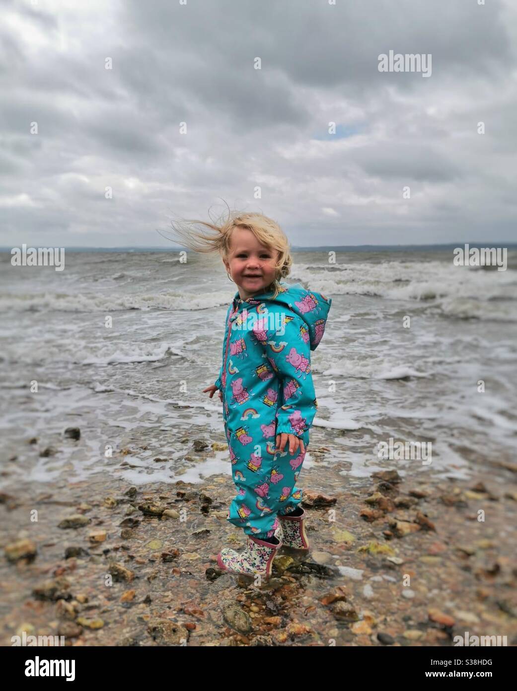 Windy day at the beach Stock Photo - Alamy