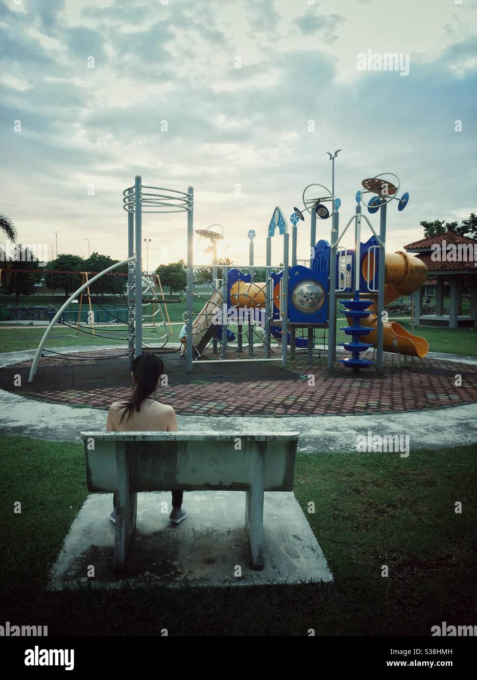 Seated alone. - Smartphone Captured Stock Image