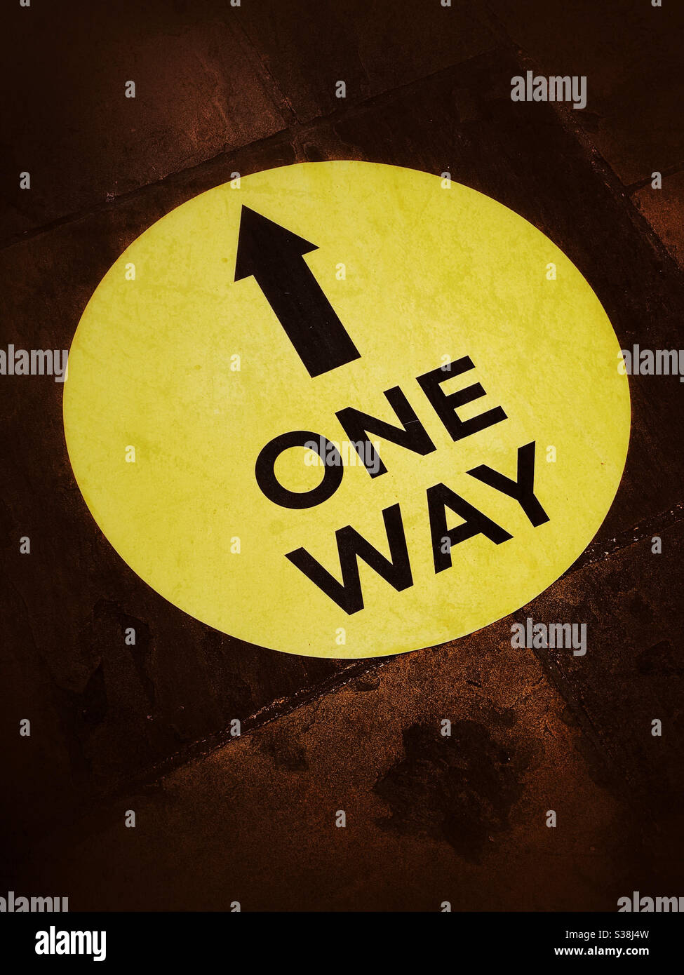 One way sign. The only way is up? You can only go one way. Photo Credit - ©️ COLIN HOSKINS. - Smartphone Captured Stock Image