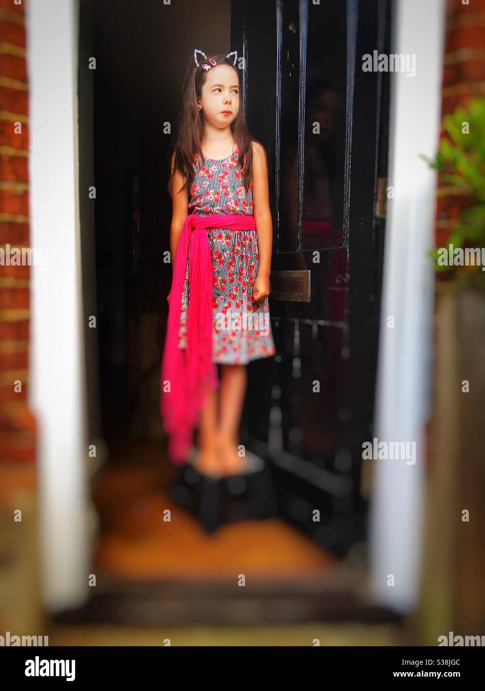 8-year old girl during lockdown - Smartphone Captured Stock Image