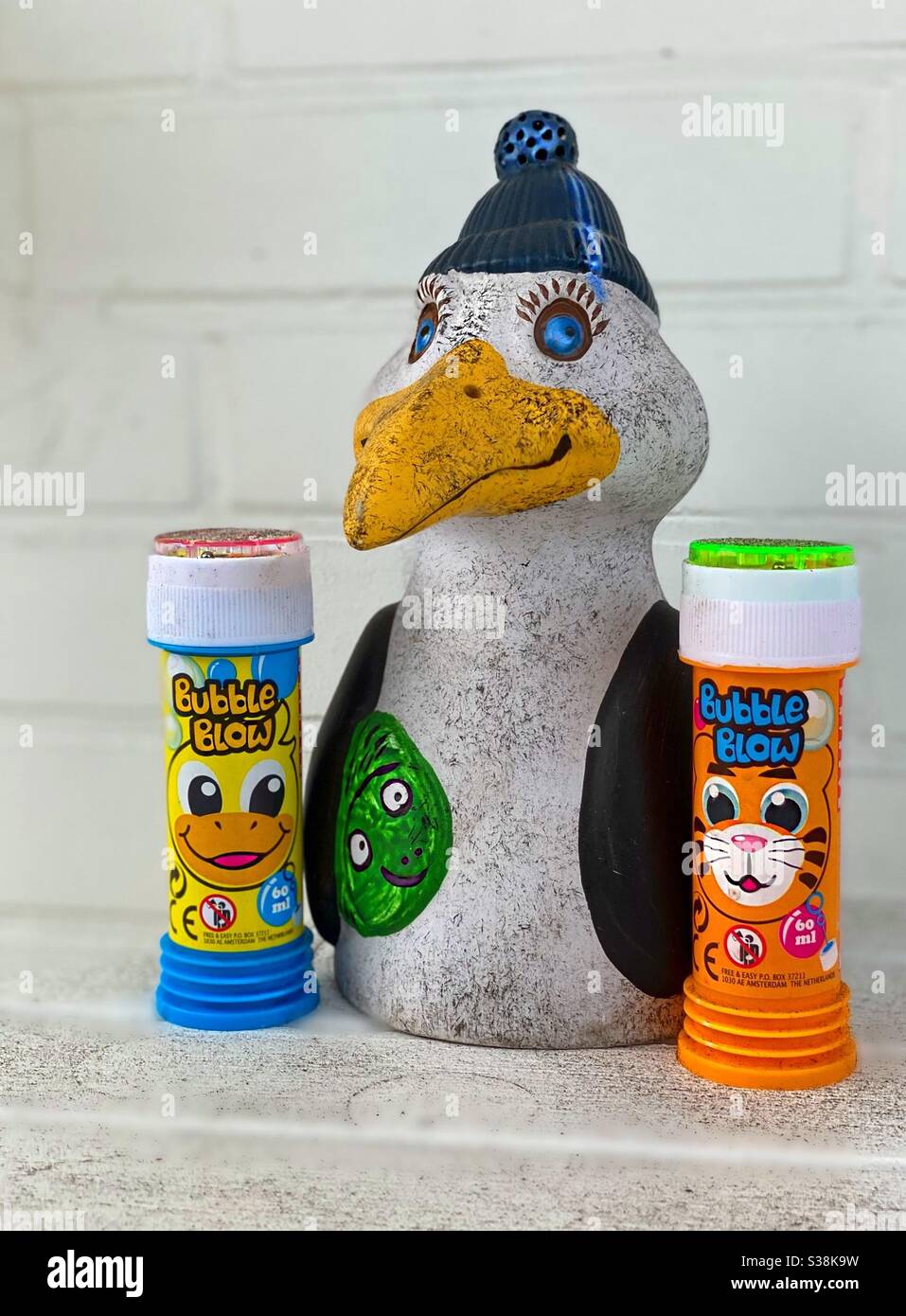 Smiling Toy Boy with His Two Girlies. - Smartphone Captured Stock Image