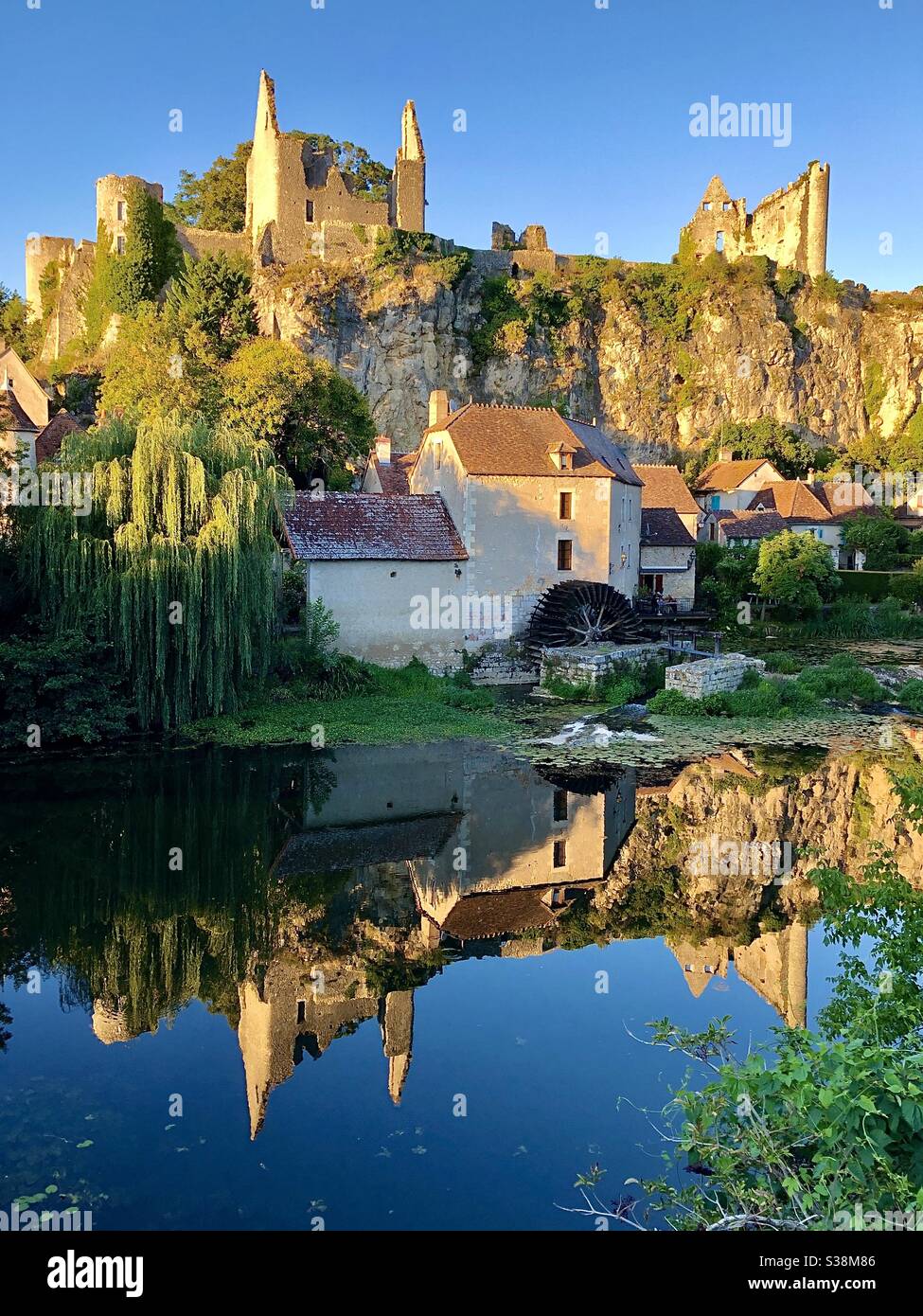 Evening light on the ruined château of Angles-sur-l’Anglin in the Vienne, France. - Smartphone Captured Stock Image