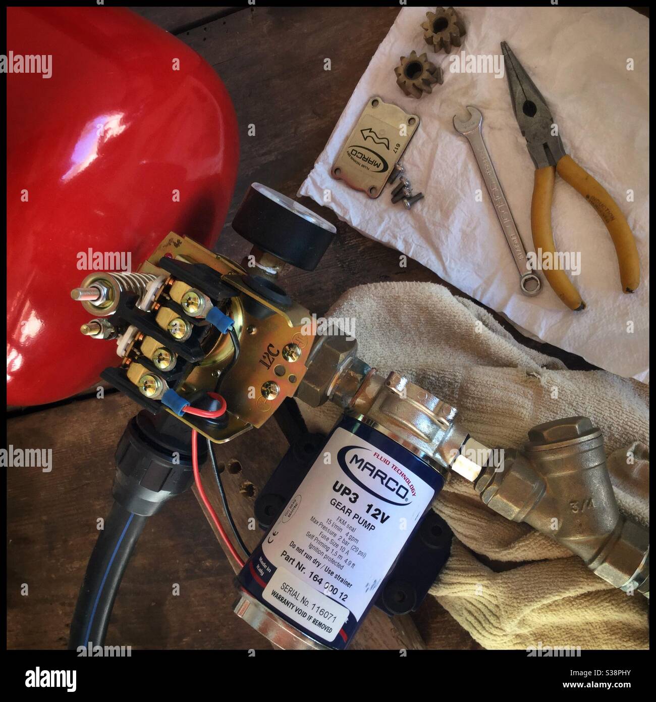 Servicing a water pump, Catalonia, Spain. - Smartphone Captured Stock Image