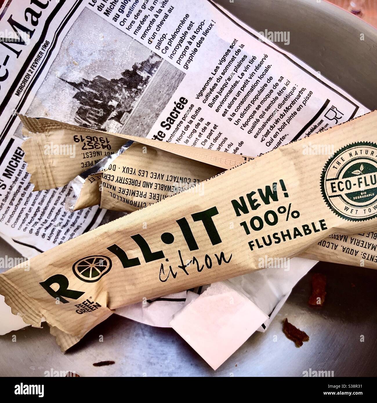 Individual « Roll It » biodegradable lemon scented finger wipe given with seafoods in French restaurants. - Smartphone Captured Stock Image