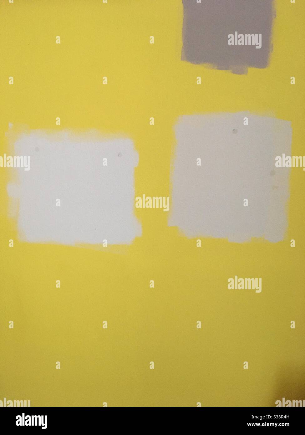 Paint samples on wall for decorating Stock Photo Alamy